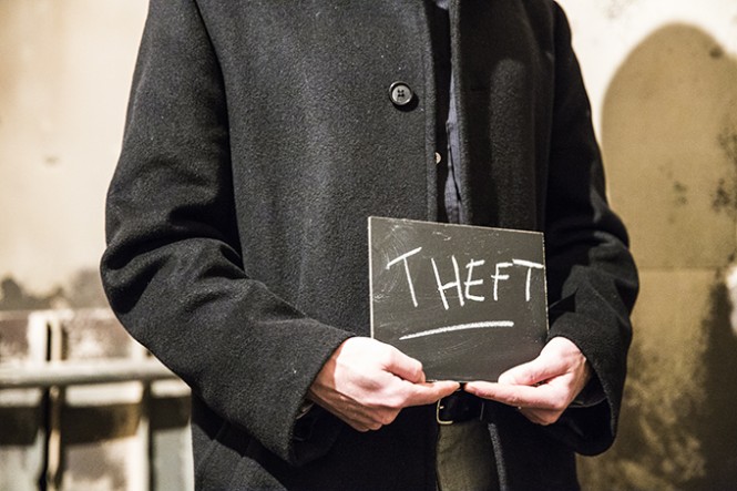 confess theft black coat